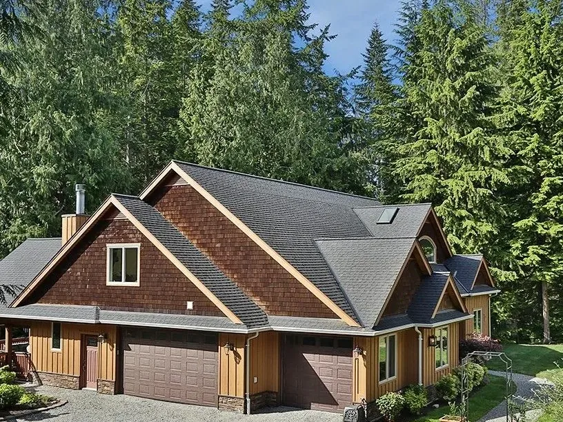 Home with cedar shingle gables and board-and-batten siding
